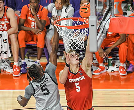 Clemson forward Hunter Tyson (5) shoots near USC Upstate guard Jordyn Surratt (5) during the second half at Littlejohn Coliseum Tuesday, November 15, 2022.

Ncaa Acc Clemson Basketball Vs Usc Upstate