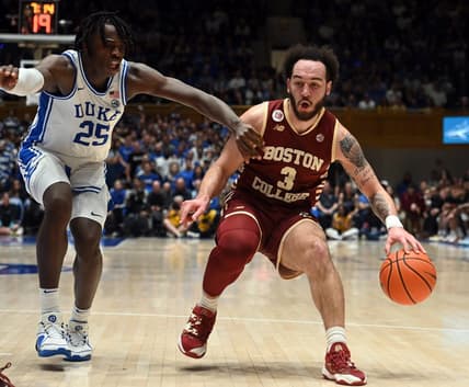 Feb 10, 2024; Durham, North Carolina, USA; Boston College Eagles guard Jaeden Zackery (3) controls the ball against Duke Blue Devils forward Mark Mitchell (25) during the first half  at Cameron Indoor Stadium. Mandatory Credit: Rob Kinnan-USA TODAY Sports