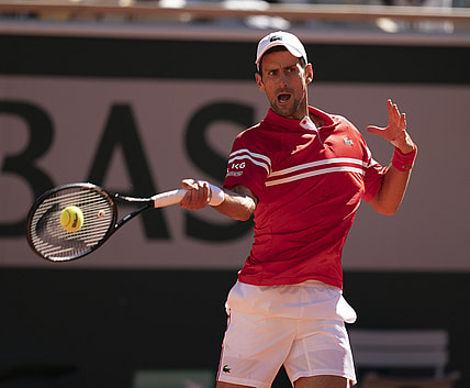 Jun 13, 2021; Paris, France; Novak Djokovic (SRB) in action during the men's final against Stefanos Tsitsipas (GRE) on day 15 of the French Open at Stade Roland Garros. Mandatory Credit: Susan Mullane-USA TODAY Sports