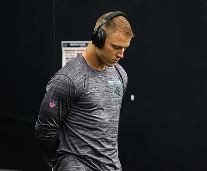 Sep 23, 2021; Houston, Texas, USA; Carolina Panthers running back Christian McCaffrey (22) prepares to walk onto the field before the game against the Houston Texans at NRG Stadium. Mandatory Credit: Troy Taormina-USA TODAY Sports