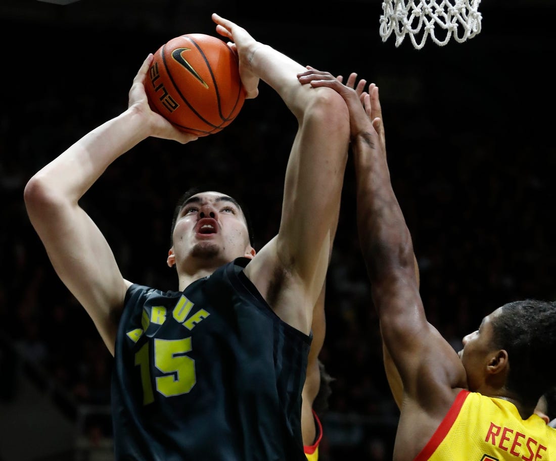 Maryland Terrapins forward Julian Reese (10) defends the shot of Purdue Boilermakers center Zach Edey (15) during the NCAA men   s basketball game, Sunday, Jan. 22, 2023, at Mackey Arena in West Lafayette, Ind. Purdue won 58-55.

Purmary012223 Am09127