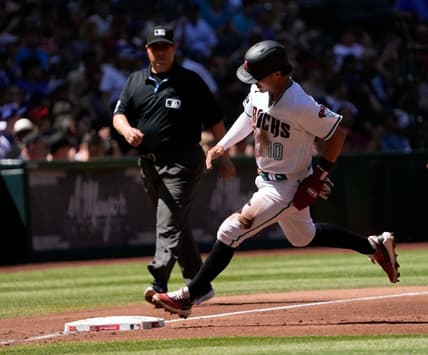 Apr 9, 2023; Phoenix, Ariz., U.S.;  Arizona Diamondbacks 3B Josh Rojas (10) rounds third base before scoring against the Los Angeles Dodgers during the first inning at Chase Field.

Mlb Dodgers At D Backs