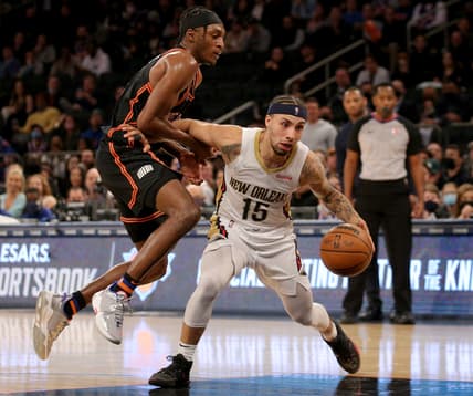 Jan 20, 2022; New York, New York, USA; New Orleans Pelicans guard Jose Alvarado (15) controls the ball against New York Knicks guard Immanuel Quickley (5) during the fourth quarter at Madison Square Garden. Mandatory Credit: Brad Penner-USA TODAY Sports