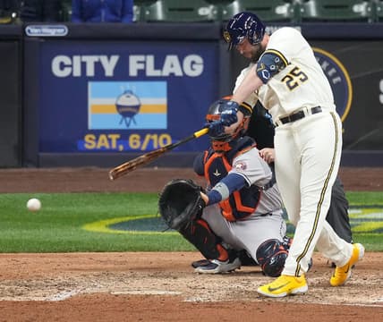 Milwaukee Brewers designated hitter Darin Ruf (25) hits a single during the eighth inning of the game against the Houston Astros Monday, May 22, 2023 at American Family Field in Milwaukee, Wis.