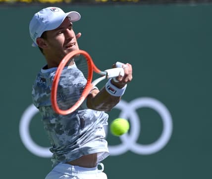 Oct 14, 2021; Indian Wells, CA, USA;  Diego Schwartzman (ARG) hits a shot against Cameron Norrie (GBR) in their quarterfinal match during the BNP Paribas Open at the Indian Wells Tennis Garden. Mandatory Credit: Jayne Kamin-Oncea-USA TODAY Sports