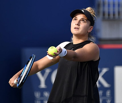 Aug 9, 2021; Montreal, Quebec, Canada; Clara Burel of France serves against Ons Jabeur of Tunisia (not pictured) during first round play at Stade IGA. Mandatory Credit: Eric Bolte-USA TODAY Sports