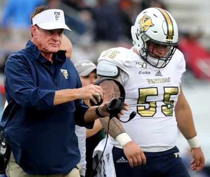 FIU head coach Butch Davis walks off the field with a hurt player FIU offensive lineman Shane McGough (55) during the game against MTSU on Saturday, Oct. 26, 2019, at MTSU.

37 Mtsu V Fiu
