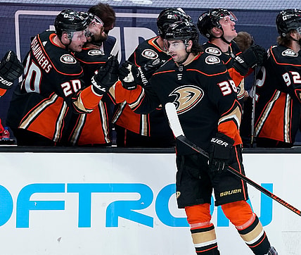 Apr 4, 2021; Anaheim, California, USA; Anaheim Ducks center Derek Grant (38) celebrates scoring a goal in the first period against the Arizona Coyotes at Honda Center. Mandatory Credit: Robert Hanashiro-USA TODAY Sports