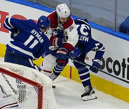 May 20, 2021; Toronto, Ontario, CAN; Montreal Canadiens defenseman Ben Chiarot (8) roughs up Toronto Maple Leafs forward Auston Matthews (34) during the second period of game one of the first round of the 2021 Stanley Cup Playoffs at Scotiabank Arena. Mandatory Credit: John E. Sokolowski-USA TODAY Sports