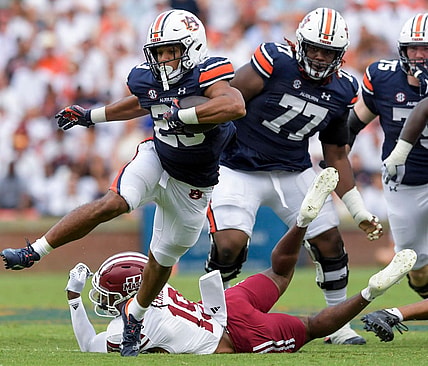 Auburn Tigers running back Jeremiah Cobb (23) breaks free for a long touchdown run against UMass during their game at Jordan-Hare Stadium on the Auburn University campus in Auburn, Ala., on Saturday September 2, 2023.