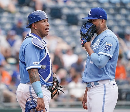 Jun 12, 2022; Kansas City, Missouri, USA; Kansas City Royals catcher Salvador Perez (13) talks with relief pitcher Joel Payamps (38) against the Baltimore Orioles during the game at Kauffman Stadium. Mandatory Credit: Denny Medley-USA TODAY Sports