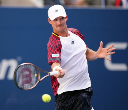 Sep 2, 2022; Flushing, NY, USA; Tommy Paul of the United States hits to Casper Ruud of Norway on day five of the 2022 U.S. Open tennis tournament at USTA Billie Jean King Tennis Center. Mandatory Credit: Danielle Parhizkaran-USA TODAY Sports