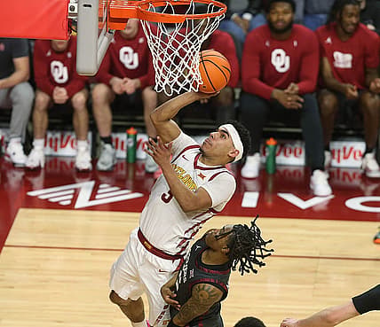Iowa State Cyclones guard Tamin Lipsey (3) takes a shoot around Oklahoma Sooners guard Rivaldo Soares (5) during the first half in the Big-12 conference showdown at Hilton Coliseum on Wednesday, Feb. 28, 2024, in Ames, Iowa.