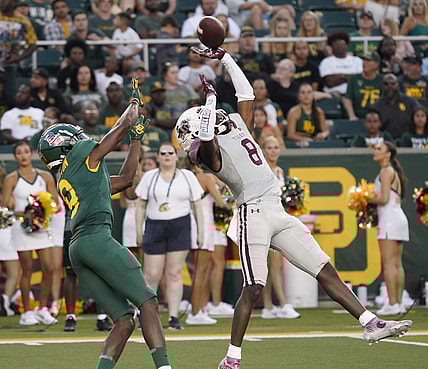 Sep 11, 2021; Waco, Texas, USA; Texas Southern Tigers defensive back Ja'Corey Benjamin (8) breaks up a pass intended for Baylor Bears wide receiver Tyquan Thornton (9) at McLane Stadium. Mandatory Credit: Scott Wachter-USA TODAY Sports