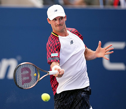 Sep 2, 2022; Flushing, NY, USA; Tommy Paul of the United States hits to Casper Ruud of Norway on day five of the 2022 U.S. Open tennis tournament at USTA Billie Jean King Tennis Center. Mandatory Credit: Danielle Parhizkaran-USA TODAY Sports