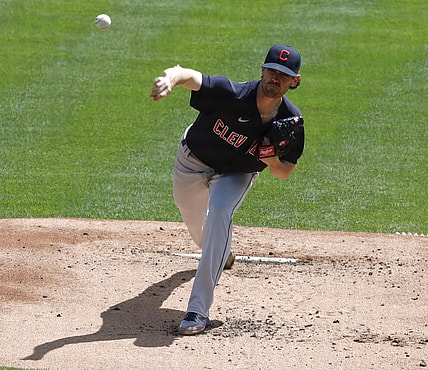 Apr 18, 2021; Cincinnati, Ohio, USA; Cleveland Indians starting pitcher Shane Bieber (57) throws against the Cincinnati Reds during the first inning at Great American Ball Park. Mandatory Credit: David Kohl-USA TODAY Sports
