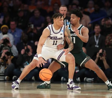 Michigan State guard A.J. Hoggard defends against Kansas State forward Keyontae Johnson during the first half of MSU's 98-93 overtime loss in the Sweet 16 on Thursday, March 23, 2023, in New York.

Msuku 032323 Kd2564