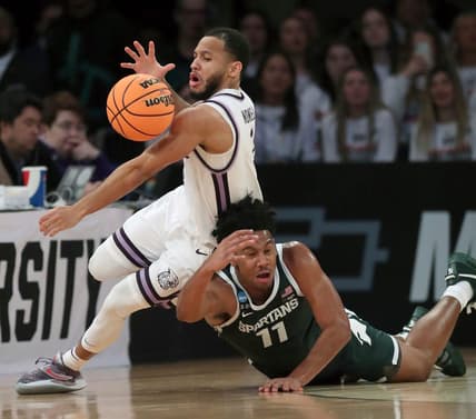 Michigan State guard A.J. Hoggard defends against Kansas State guard Markquis Nowell during the second half of MSU's 98-93 overtime loss in the Sweet 16 on Thursday, March 23, 2023, in New York.

Msuku 032323 Kd6326