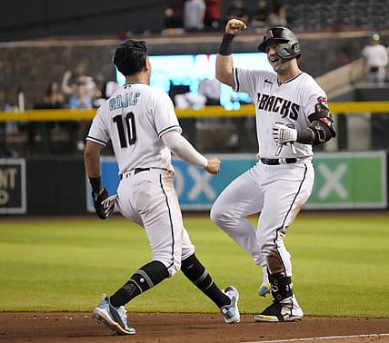Jun 28, 2022; Phoenix, Ariz., U.S.;  Arizona Diamondbacks' Arizona Diamondbacks' Christian Walker (53) and Josh Rojas (10) celebrate after beating the San Diego Padres 7-6 on a fielder's choice in the ninth inning at Chase Field. Mandatory Credit: Michael Chow-Arizona Republic

Mlb Padres At D Backs