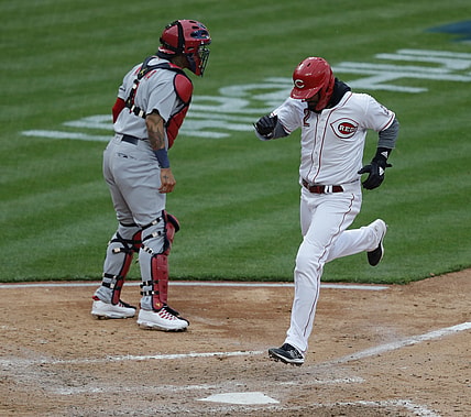 Apr 1, 2021; Cincinnati, Ohio, USA; Cincinnati Reds right fielder Nick Castellanos (2) scores against the St. Louis Cardinals during the fifth inning at Great American Ball Park. Mandatory Credit: David Kohl-USA TODAY Sports