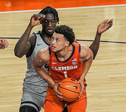 Clemson junior guard Chase Hunter (1) shoots near USC Upstate forward Sent Ndiaye (45) during the first half at Littlejohn Coliseum Tuesday, November 15, 2022.

Ncaa Acc Clemson Basketball Vs Usc Upstate