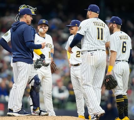 Brewers players meet at the pitching mound as they fall behind the Angels during the seventh inning on Sunday April 30, 2023 at American Family Field in Milwaukee, Wis.