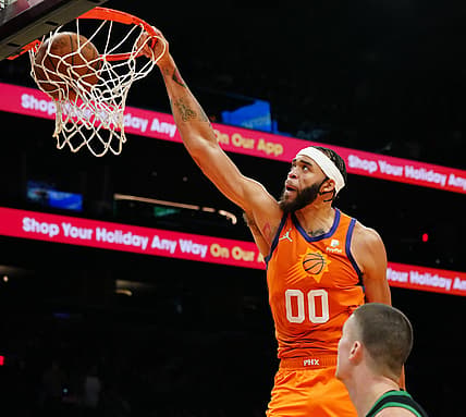 Dec 10, 2021; Phoenix, AZ, United States; Suns' JaVale McGee (00) dunks against the Celtics during the second half at the Footprint Center. Mandatory Credit: Patrick Breen-Arizona Republic

Suns V Celtics