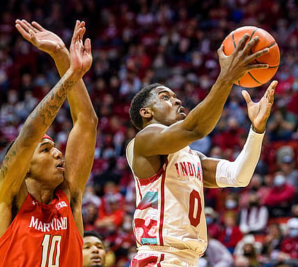 Indiana's Xavier Johnson (0) shoots in front of Maryland's Julian Reese (10) during the first half of the Indiana versus Maryland men's basketball game at Simon Skjodt Assembly Hall on Thursday, Feb. 24, 2022.

Iu Md Bb 1h Johnson 2