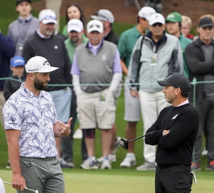 Apr 3, 2023; Augusta, Georgia, USA; Jon Rahm and Sergio Garcia talk at the practice facility during a practice round for The Masters golf tournament at Augusta National Golf Club. Mandatory Credit: Danielle Parhizkaran-USA TODAY Network

Pga The Masters Practice Round