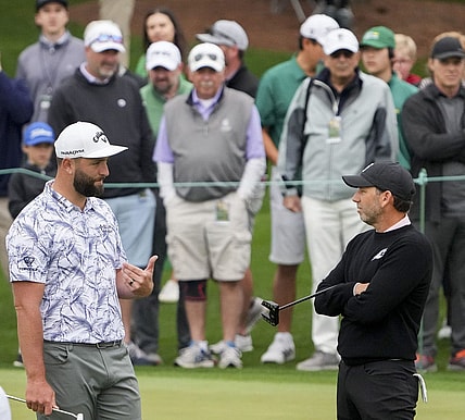 Apr 3, 2023; Augusta, Georgia, USA; Jon Rahm and Sergio Garcia talk at the practice facility during a practice round for The Masters golf tournament at Augusta National Golf Club. Mandatory Credit: Danielle Parhizkaran-USA TODAY Network

Pga The Masters Practice Round