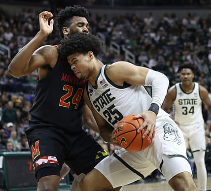 Michigan State Spartans forward Malik Hall (25) drives against Maryland Terrapins forward Donta Scott (24) during first half action Sunday, Mar. 6, 2022 at the Breslin Center.

Msu Mary