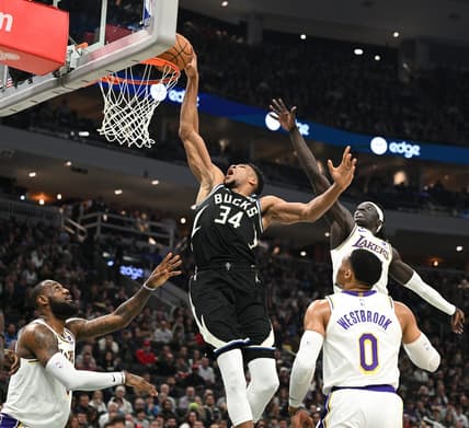 Dec 2, 2022; Milwaukee, Wisconsin, USA; Milwaukee Bucks forward Giannis Antetokounmpo (34) dunks the ball against Los Angeles Lakers  at Fiserv Forum. Mandatory Credit: Michael McLoone-USA TODAY Sports