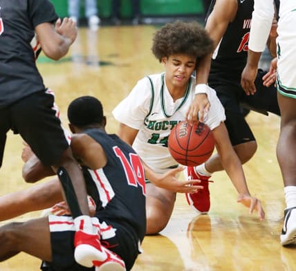 Choctaws Asa Newell scrambles for the ball in action from crosstown rivals Choctaw and Fort Walton Beach boys basketball game at Choctaw.

Choctaw Fwb Bbb