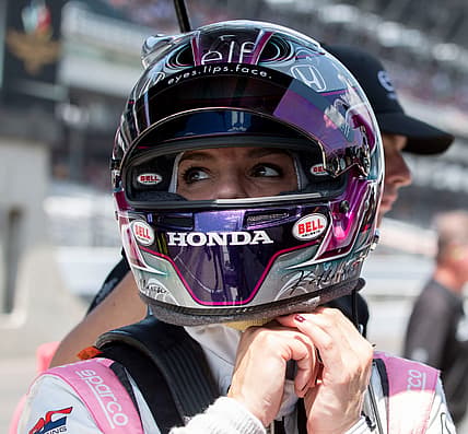 Dale Coyne Racing with RWR driver Katherine Legge (51) takes off her helmet Sunday, May 19, 2024, during practice ahead of