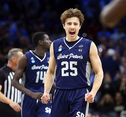 Mar 25, 2022; Philadelphia, PA, USA; Saint Peter's Doug Edert reacts late in the second half of the Peacocks' 67-64 win to advance to the Elite Eight in the NCAA tournament at the Wells Fargo Center in Philadelphia, March 25, 2022. Mandatory Credit: William Bretzger-USA TODAY NETWORK