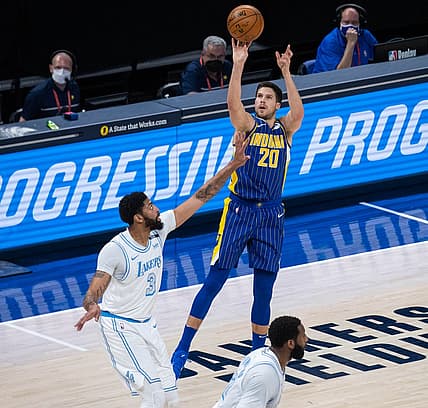 May 15, 2021; Indianapolis, Indiana, USA; Indiana Pacers forward Doug McDermott (20) shoots the ball while Los Angeles Lakers forward Anthony Davis (3) defends in the first quarter at Bankers Life Fieldhouse. Mandatory Credit: Trevor Ruszkowski-USA TODAY Sports