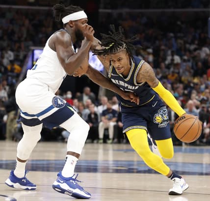 Apr 26, 2022; Memphis, Tennessee, USA; Minnesota Timberwolves guard Patrick Beverley (22) guards Memphis Grizzlies guard Ja Morant (12) during the first half of game five of the first round for the 2022 NBA playoffs at FedExForum. Mandatory Credit: Christine Tannous-USA TODAY Sports