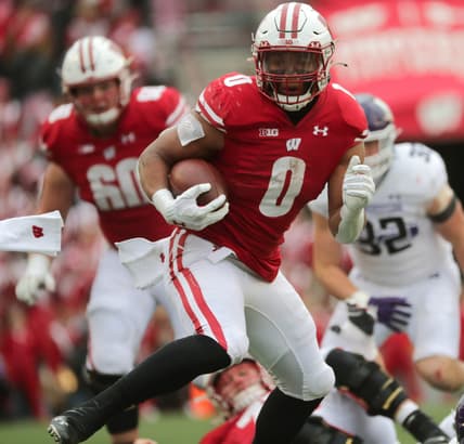Wisconsin running back Braelon Allen (0) runs 33 yards for a touchdown during the third quarter of their game Saturday, November 13, 2021 at Camp Randall Stadium in Madison, Wis. Wisconsin beat Northwestern 35-7.
Uwgrid14 24