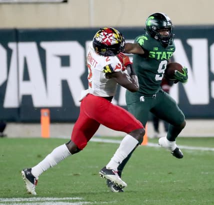Michigan State Spartans running back Kenneth Walker III (9) runs by Maryland Terrapins defensive back Jakorian Bennett (2) during second half action Saturday, Nov. 13, 2021 at Spartan Stadium.
Msu Mary