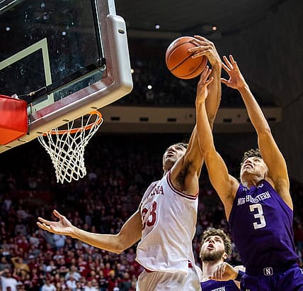 Indiana's Trayce Jackson-Davis (23) grabs a rebound from Northwestern's Ty Berry (3) during the second half of the Indiana versus Northwestern men's basketball game at Simon Skjodt Assembly Hall on Sunday, Jan. 8, 2023.

Iu Nw Bb 2h Tjd 1