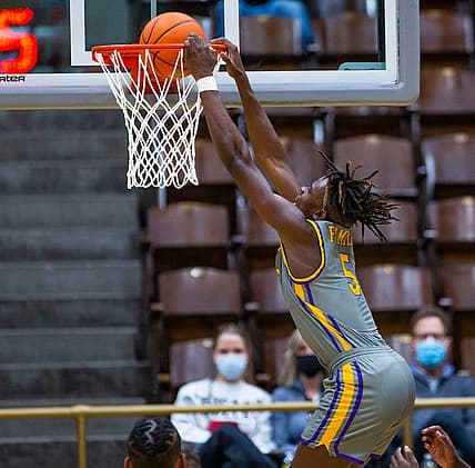 Legacy Early College's Coen Carr dunks during the LaLumiere vs. Legacy Early College NIBC Tournament basketball game Thursday, Jan. 6, 2022 at the LaPorte Civic Auditorium.

La Lumiere Vs Legacy Early College