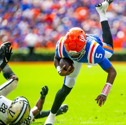 Florida Gators quarterback Emory Jones (5) flies forward for extra yards in the first half. The Florida Gators lead 21-0 at the half over the Vanderbilt Commodores Saturday afternoon, October 9, 2021 at Ben Hill Griffin Stadium in Gainesville, FL. [Doug Engle/Gainesville Sun]2021

Flgai 100921 Gatorgamevandy
