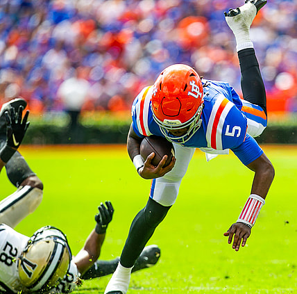 Florida Gators quarterback Emory Jones (5) flies forward for extra yards in the first half. The Florida Gators lead 21-0 at the half over the Vanderbilt Commodores Saturday afternoon, October 9, 2021 at Ben Hill Griffin Stadium in Gainesville, FL. [Doug Engle/Gainesville Sun]2021

Flgai 100921 Gatorgamevandy