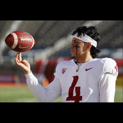 Dec 19, 2020; Salt Lake City, Utah, USA; Washington State Cougars quarterback Jayden de Laura (4) prepares for their game against the Utah Utes at Rice-Eccles Stadium. Mandatory Credit: Jeffrey Swinger-USA TODAY Sports