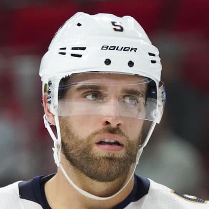 Nov 7, 2017; Raleigh, NC, USA;  Florida Panthers defensemen Aaron Ekblad (5) looks on during the time out against the Carolina Hurricanes at PNC Arena. The Carolina Hurricanes defeated the Florida Panthers 3-1. Mandatory Credit: James Guillory-USA TODAY Sports
