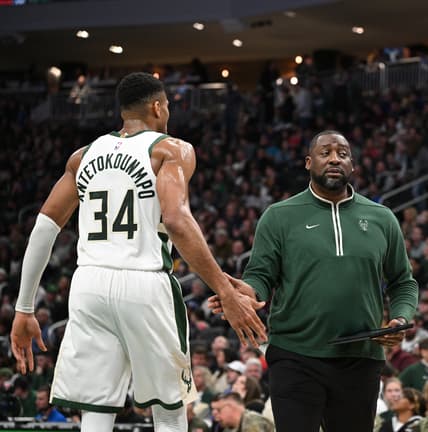 Milwaukee Bucks' Giannis Antetokounmpo and Adrian Griffin