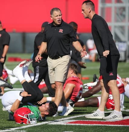 Quarterback, Noah Vedral, head coach Greg Schiano with offensive coordinator Sean Gleeson as Rutgers football players participate in their first day of training camp to start the 2022 season at their practice facility in Piscataway, NJ on August 3, 2022.

Rutgers Football Players Participate In Their First Day Of Training Camp To Start The 2022 Season At Their Practice Facility In Piscataway Nj On August 3 2022