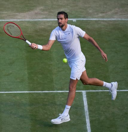 Jul 3, 2021; London, United Kingdom;  Marin Cilic (CRO) plays Daniil Medvedev (RUS)  on No 1 court in the men   s third round at All England Lawn Tennis and Croquet Club. Mandatory Credit: Peter van den Berg-USA TODAY Sports