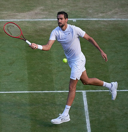 Jul 3, 2021; London, United Kingdom;  Marin Cilic (CRO) plays Daniil Medvedev (RUS)  on No 1 court in the men   s third round at All England Lawn Tennis and Croquet Club. Mandatory Credit: Peter van den Berg-USA TODAY Sports