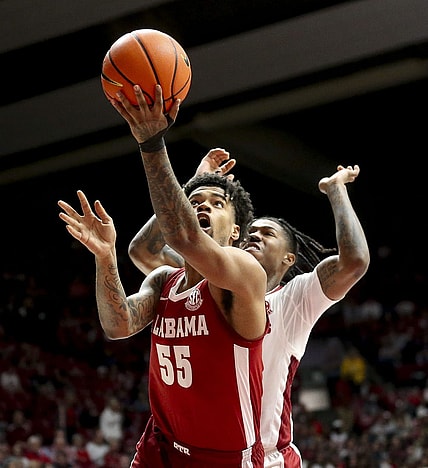 Mar 9, 2024; Tuscaloosa, Alabama, USA;  Alabama Crimson Tide guard Aaron Estrada goes to the hoop against Arkansas Razorbacks at Coleman Coliseum. Mandatory Credit: Gary Cosby Jr.-USA TODAY Sports